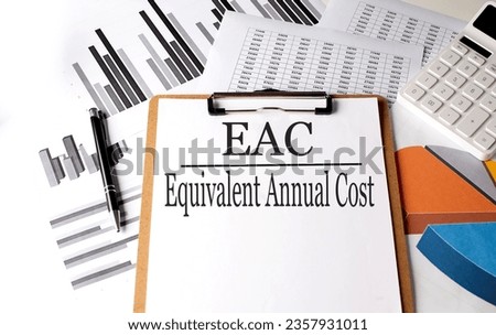 Paper with EAC on a chart background, business