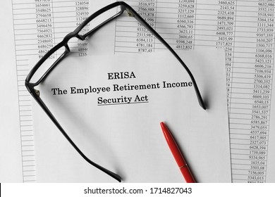 Paper With Employee Retirement Income Security Act ERISA On A Table. Business Concept