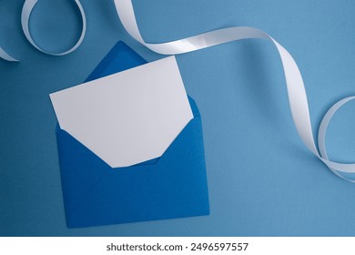 Paper envelopes on a light background. New mail, write a message. Send and receive mail. Postal delivery service. Empty envelope, empty space. Communication with people, paperwork. Envelope close-up - Powered by Shutterstock