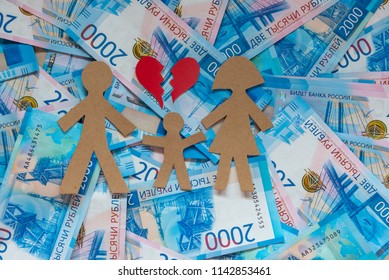 A Paper Family And A Broken Heart In The Background Of Money