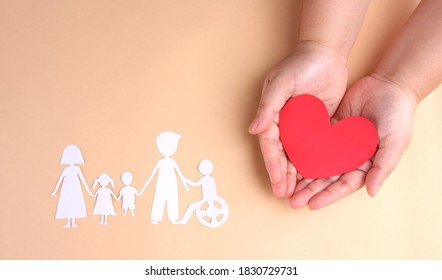 paper family cutout on yellow background. - Powered by Shutterstock
