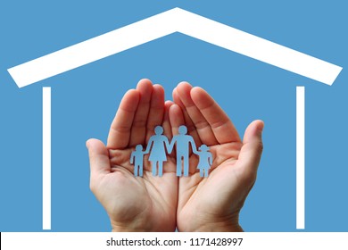 Paper Family In Hands With Home On Blue Background Welfare Concept