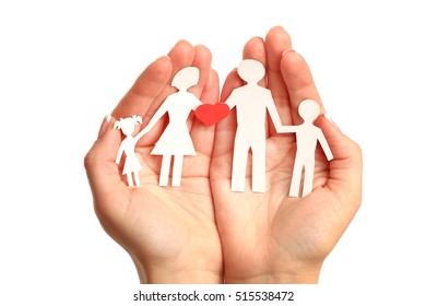 Paper family in hands isolated on white background - Shutterstock ID 515538472