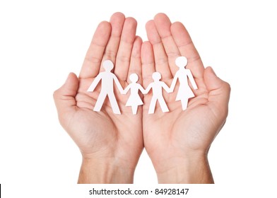 Paper Family In Hands Isolated On White Background