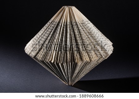 a paper folded old book