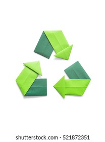 Paper folded origami recycling symbol environmental concept - Shutterstock ID 521872351