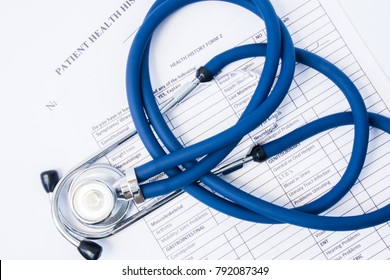 
Paper Form Patient History And Stethoscope On It. Concept Of Registration Of Patients In Clinic Or Hospital, Gathering Information About Disease And Primary Care Diagnostics For Preliminary Diagnosis