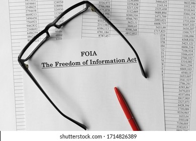 Paper with The Freedom of Information Act FOIA on a table. Business concept