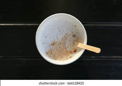 A Paper Glass With Coffee Is A Top View.