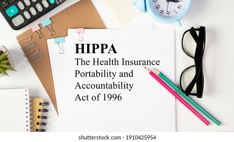Paper with HIPAA The Health Insurance Portability and Accountability Act of 1996 on a table