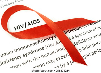 Paper With Hiv Aids And Red Ribbon