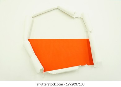 Paper Hole With Polish Flag Inside On A White Background. Flag Background, Concept Wallpaper.