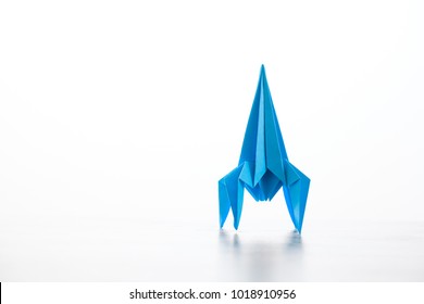 Paper homemade origami rocket. Craft work for children