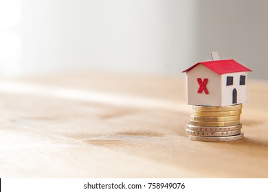 Paper House On A Coin Pile: Mortgage And Loan Rejected Concept