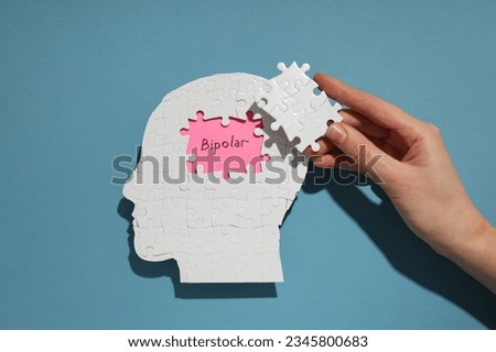 Paper human head with the word 