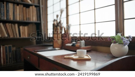 Paper, Japanese study and art document with a desk for creativity for ancient culture and activity. Temae, paint and zen with ink pot, brushes and pencil for traditional and suibokuga drawing
