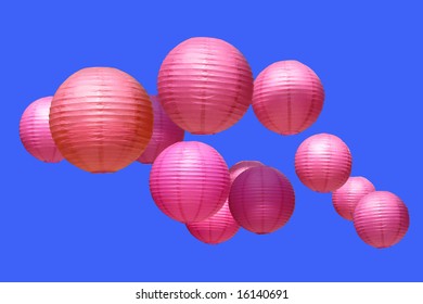 Paper lanterns floating in the sky