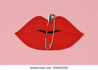 Paper Lips Cut-out Closed With Safety Pin - Violence Against Women Concept