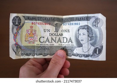 Paper Money Currency From Canada. One Dollar. Portrait Of Queen Elizabeth. Bank Of Canada