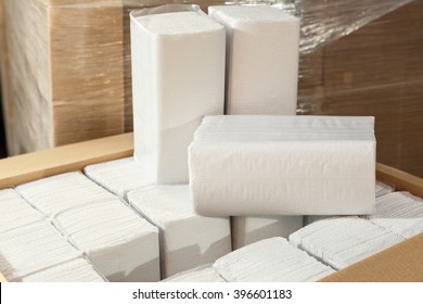 Paper napkins and towels in closeup as background
