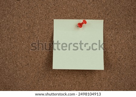 paper note reminder sticky notes pin paper on cork bulletin board. empty space for text.