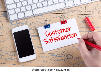 Paper note with text Customer Satisfaction
