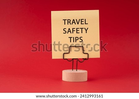 Paper note with text travel safety tips