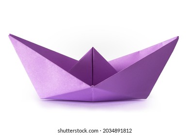 Paper Origami Purple Boat On The White Background
