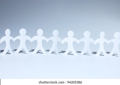 Paper People Chain Forming Heart Between Figures