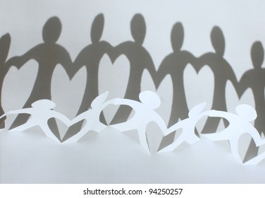 Paper People Chain Forming Heart Between Figures