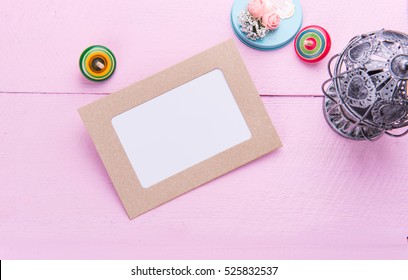 Paper Photo Frame In Pink Background.