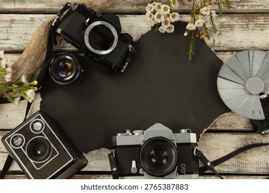 Paper piece and camera on table, Close-up
