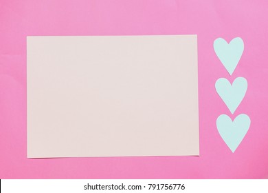 Paper pink background with empty notes and hearts. The concept of Valentine Day. Flat Lay, top view