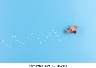 Paper Plane On Blue Background. Turbulence Concept