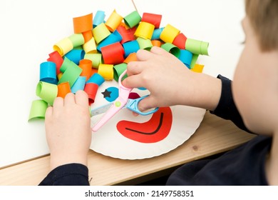 Paper Plate Clown. DIY Games At Home, Activities For Pre-school Kids. 5 Minute Crafts. Children Joy And Funny To Cut A Hair For Clown. Red Nose Day Theme.