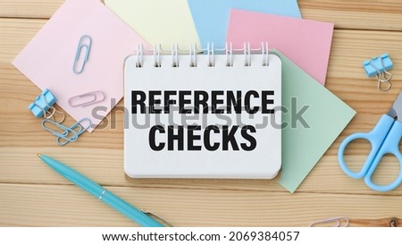 Paper plate with text REFERENCE CHECKS. Diagram, calculator, notepad and white background