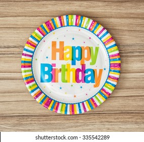 Paper Plates Designed For Birthday Party On The Wooden Background. Holidays Theme.