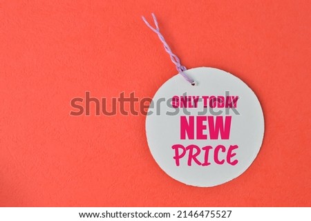 Paper price tag with text ONLY TODAY NEW PRICE