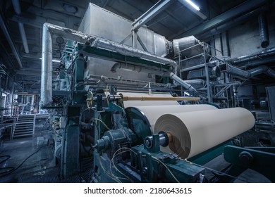 Paper production machine in wastepaper recycling factory. Paper and pulp mill. - Shutterstock ID 2180643615