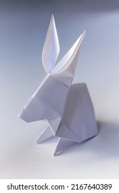 Paper rabbit origami isolated on a blank white background.