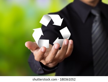 Paper Recycle Sign In Business Man Hand