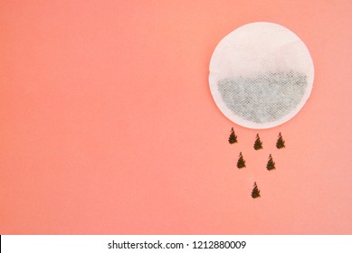 Paper Round  Tea Bag Isolated On Pink Background With Copy Space.