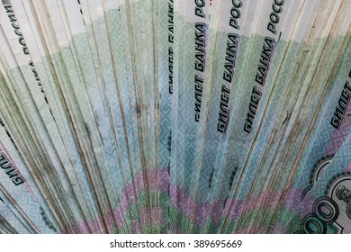 Paper Russian Federation money in large quantities. - Shutterstock ID 389695669