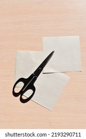 Paper scissors lying on the table