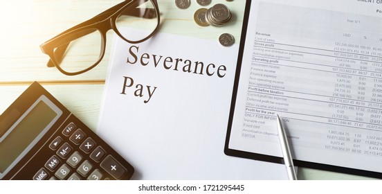 Paper with Severance Pay on a table