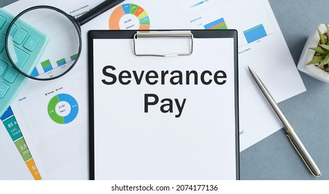 Paper with Severance Pay on a table. Business concept