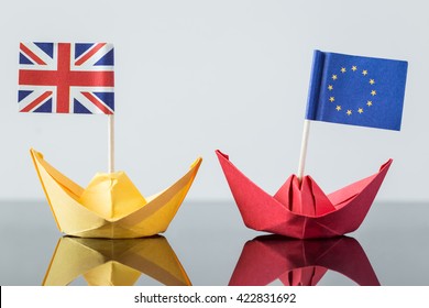 Paper Ship With British And European Flag, Concept Shipment Or Free Trade Agreement And Membership Of Eu, Brexit