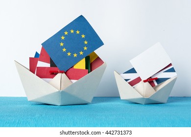 paper ship with Flags of European Union (flags of different countries eurozone) and United Kingdom, Brexit UK EU referendum concept. concept shipment or free trade agreement and membership. 