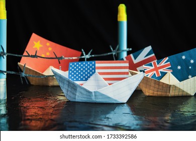 Paper Ship With Flags Of USA, Great Britain, Canada, Australia, Japan,EU And China Concept State Relations, Free Trade Agreement