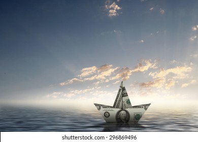 Paper Ship Floating On Water On Waves